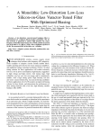 A Monolithic Low-Distortion Low-Loss Silicon-on-Glass Varactor-Tuned Filter With Optimized Biasing