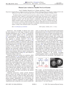 Phonon Laser Action in a Tunable Two-Level System