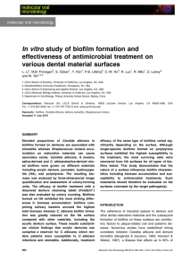In vitro study of biofilm formation and various dental material surfaces