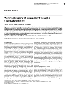Wavefront shaping of infrared light through a subwavelength hole