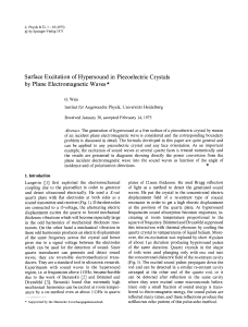 Surface excitation of hypersound in piezoelectric crystals by