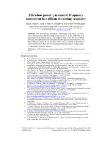 Ultra-low power parametric frequency conversion in a silicon