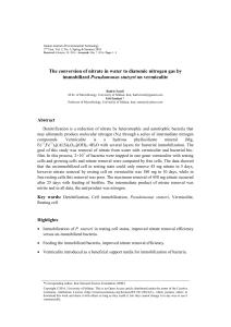 The conversion of nitrate in water to diatomic nitrogen gas by