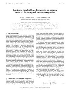 Persistent spectral hole burning in an organic material for temporal