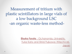 Measurement of tritium with plastic scintillators in large